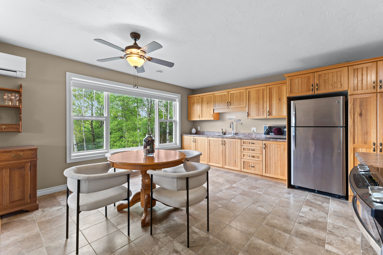 Open-concept apartment with kitchen island and living area