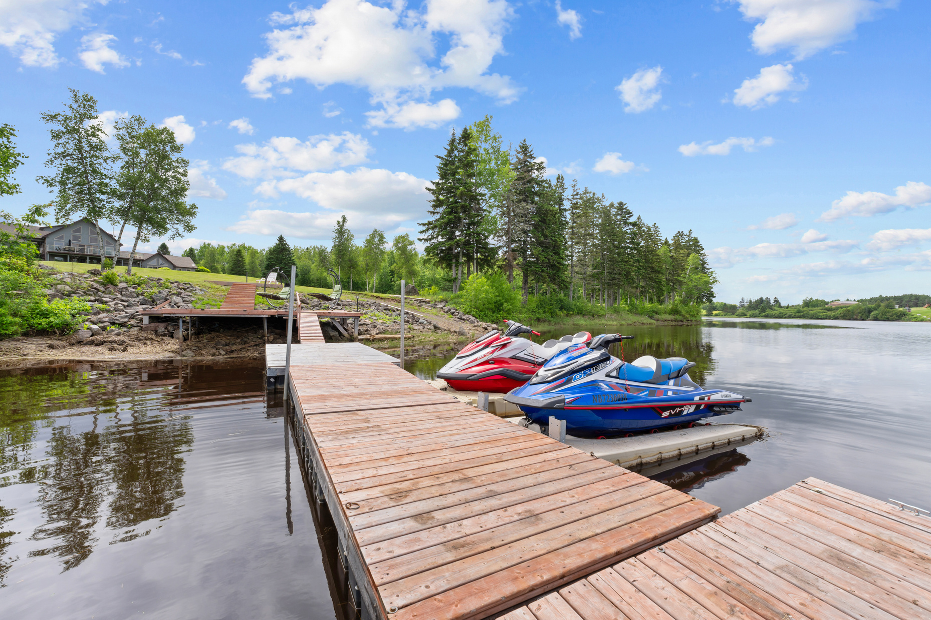 Wooden dock with jet skis